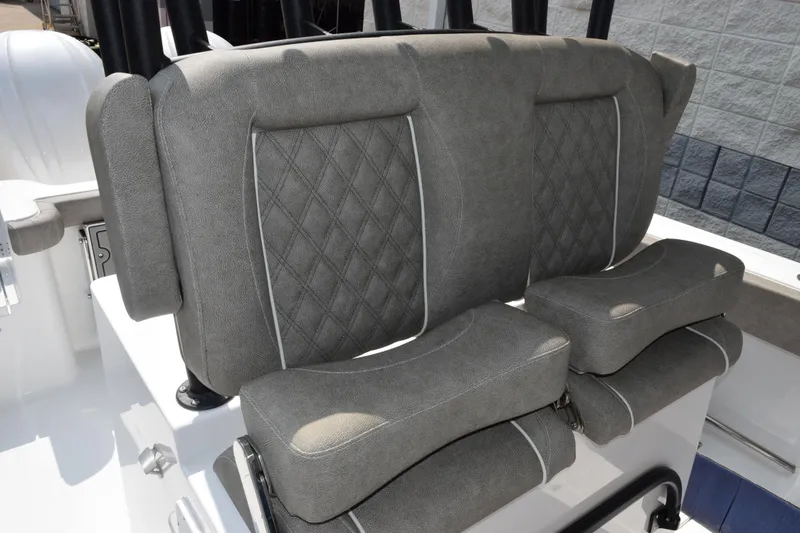 Slide: The Image of 2026 Sea Hunt Gamefish 28 Coffin Box boat seating with diamond-stitched upholstery. - 10
