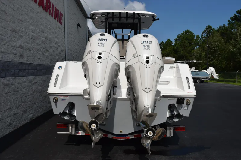 Slide: The Image of 2026 Sea Hunt Gamefish 28 Coffin Box with twin 300 V6 engines, rear view. - 5