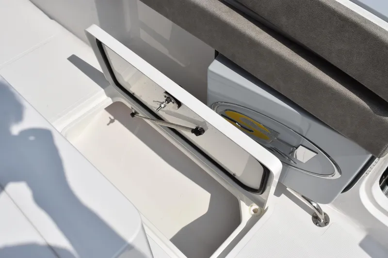 Slide: The Image of 2026 Sea Hunt Gamefish 28 Coffin Box interior storage compartment, open and empty. - 17