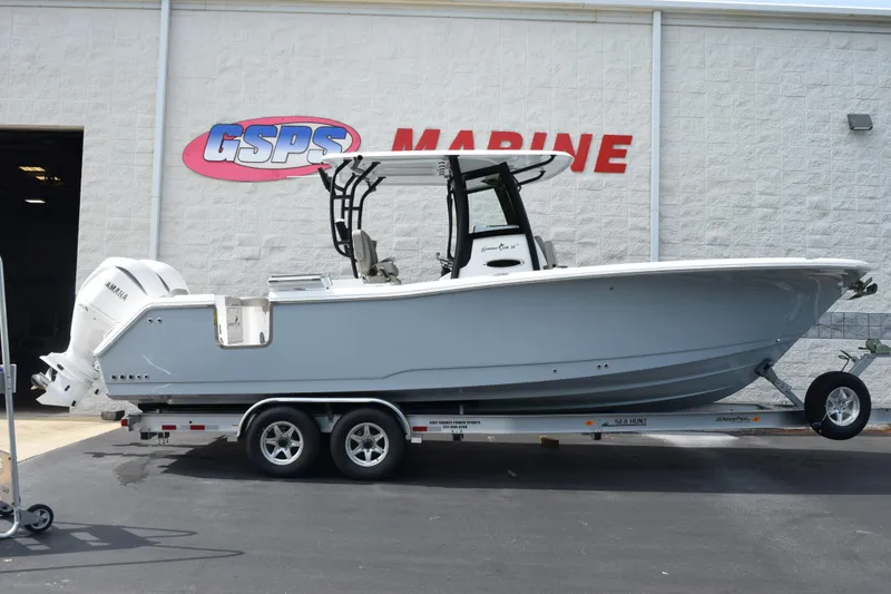 The Image of 2026 Sea Hunt Gamefish 28 Coffin Box boat on trailer at GSPS Marine dealership. - 1