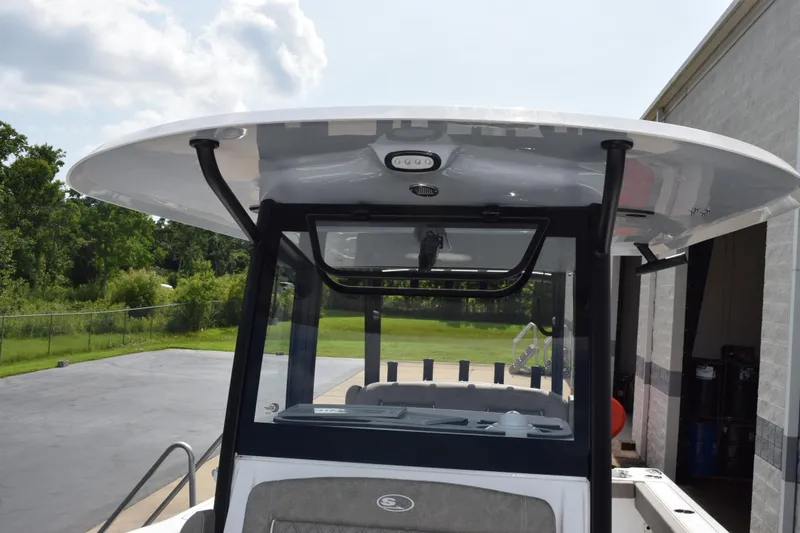 Slide: The Image of 2026 Sea Hunt Gamefish 28 Coffin Box boat, featuring a sleek T-top design. - 14