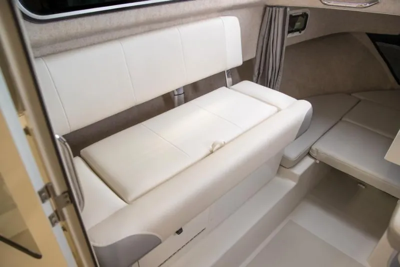 Slide: The Image of Manufacturer Provided Image: Interior seating of 2022 Parker 2120 Sport Cabin boat with white upholstery. - 40