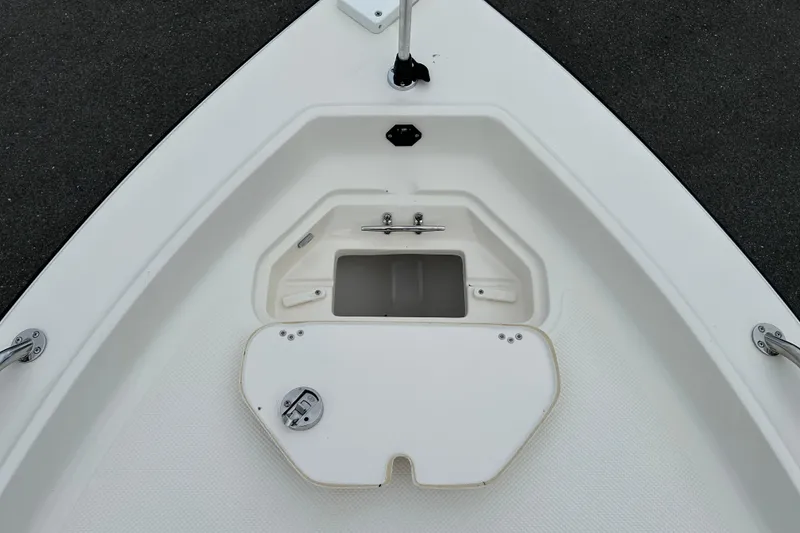 Slide: The Image of 2016 Key West 1520 Center Console boat deck with storage compartment. - 13