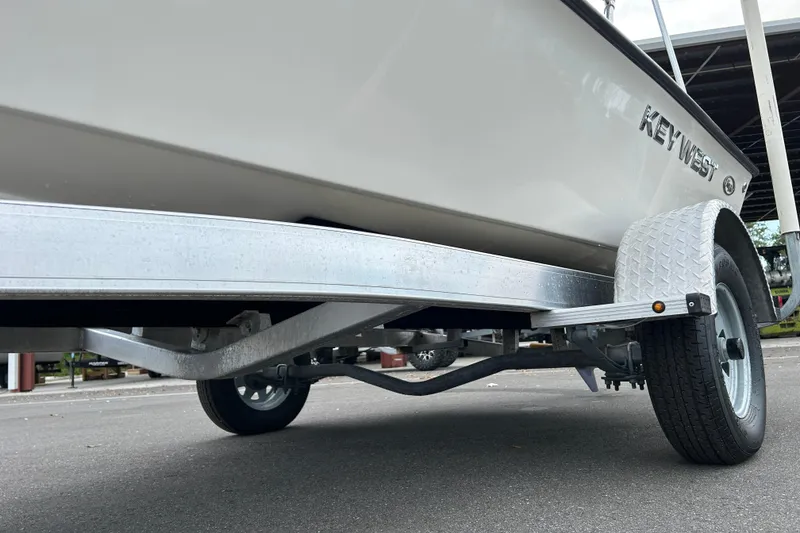 Slide: The Image of 2016 Key West 1520 Center Console boat on trailer, side view. - 17
