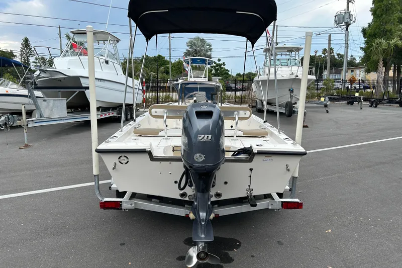 Slide: The Image of 2016 Key West 1520 Center Console boat with outboard motor on trailer. - 3