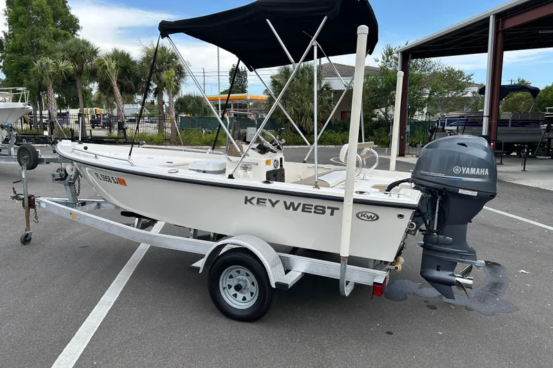 Slide: The Image of 2016 Key West 1520 Center Console boat with Yamaha outboard motor on trailer. - 4