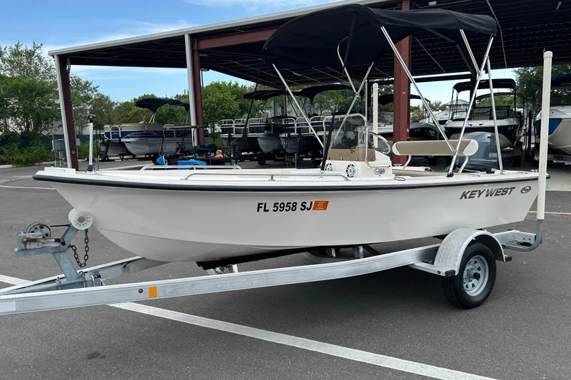 Slide: The Image of 2016 Key West 1520 Center Console boat on trailer in parking lot. - 5