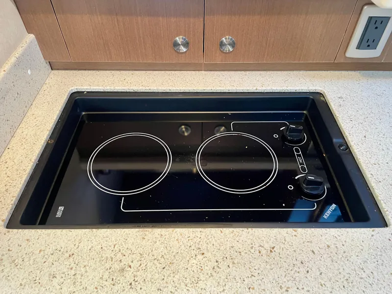 Slide: The Image of Built-in stovetop on 2014 Sea Ray 330 Sundancer yacht kitchen counter. - 12