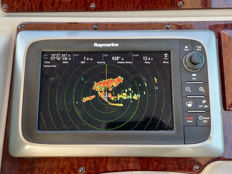 Slide: The Image of Raymarine navigation display on 2014 Sea Ray 330 Sundancer boat dashboard. - 34