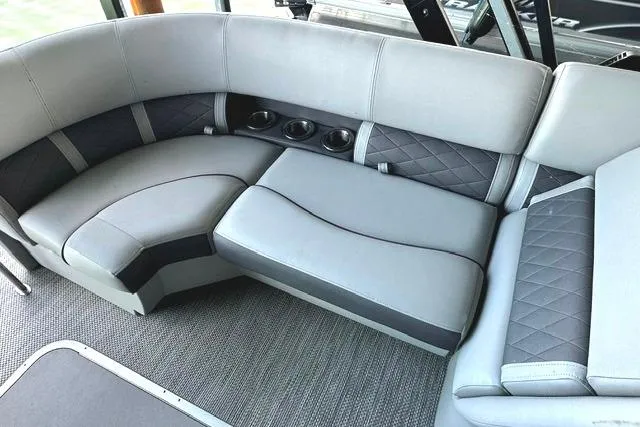 Slide: The Image of Luxurious seating on 2021 Bennington L Bowrider 25 Quad Bench with cup holders and quilted design. - 14
