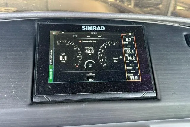 Slide: The Image of Simrad display on 2021 Bennington L Bowrider 25 Quad Bench showing navigation and fuel data. - 18