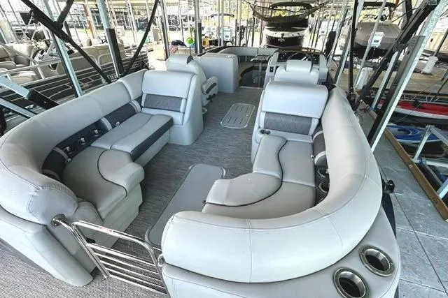 Slide: The Image of 2021 Bennington L Bowrider 25 Quad Bench interior with spacious seating and modern design. - 4
