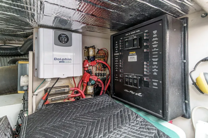 Slide: The Image of Electrical panel and Dolphin Pro charger in 2008 Sea Ray 58 Sedan Bridge yacht. - 25