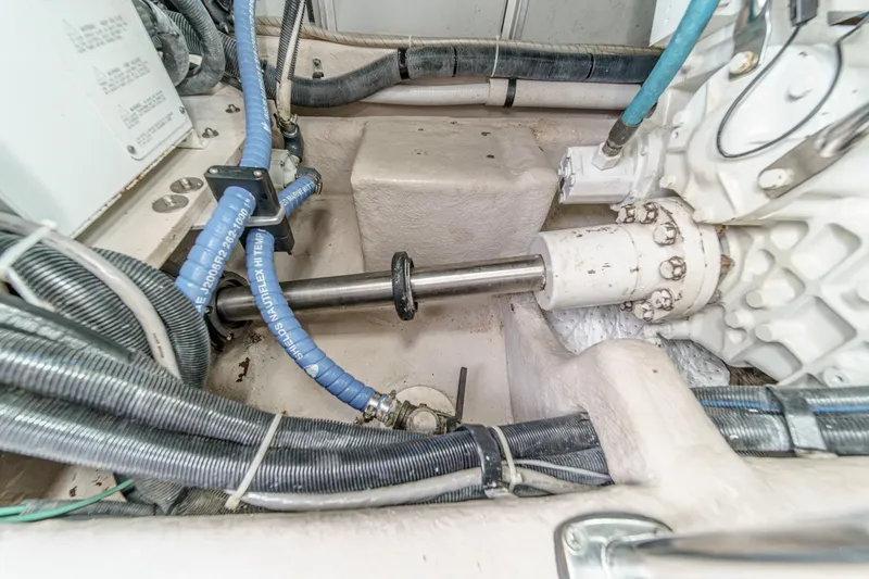Slide: The Image of Engine compartment of 2008 Sea Ray 58 Sedan Bridge with visible mechanical components. - 20