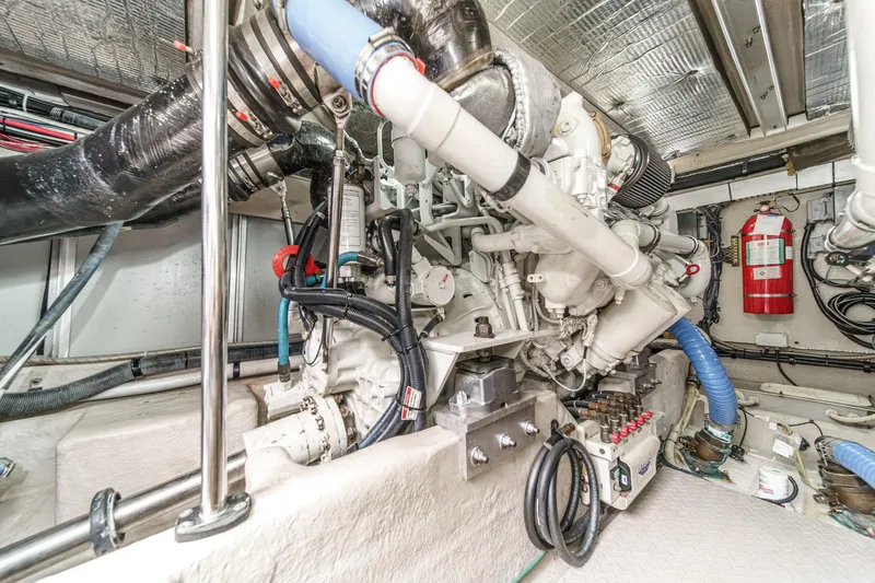 Slide: The Image of Engine room of a 2008 Sea Ray 58 Sedan Bridge yacht, showcasing mechanical components. - 19