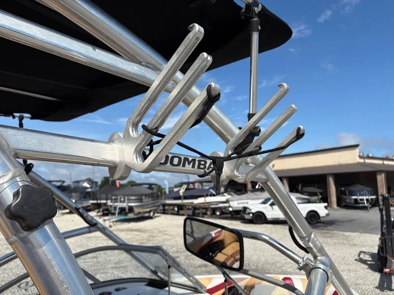 Slide: The Image of Close-up of a wakeboard tower on a 2006 Moomba Mobius LSV, with blue sky in the background. - 5