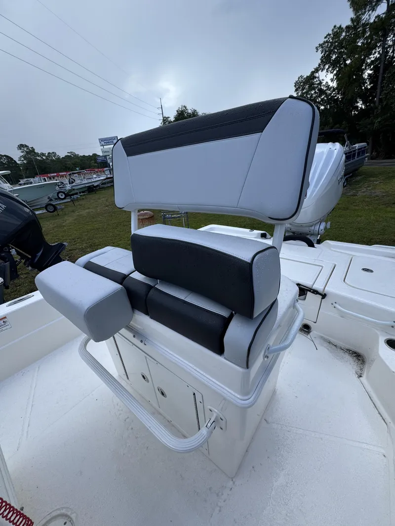 Slide: The Image of The image shows a white and black boat seat on a 2026 Skeeter SX Series SX241. - 24