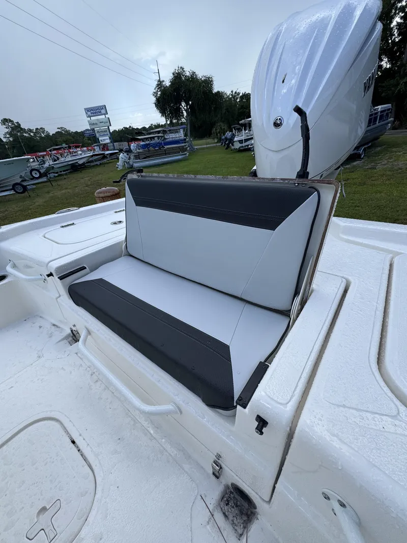 Slide: The Image of The 2026 Skeeter SX Series SX241 features a cushioned bench seat with gray and black accents. - 40