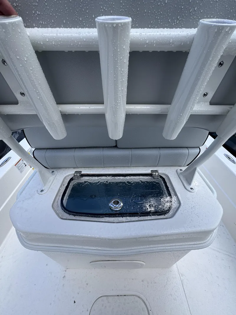 Slide: The Image of Rear view of a boat seat with a water compartment underneath. - 46