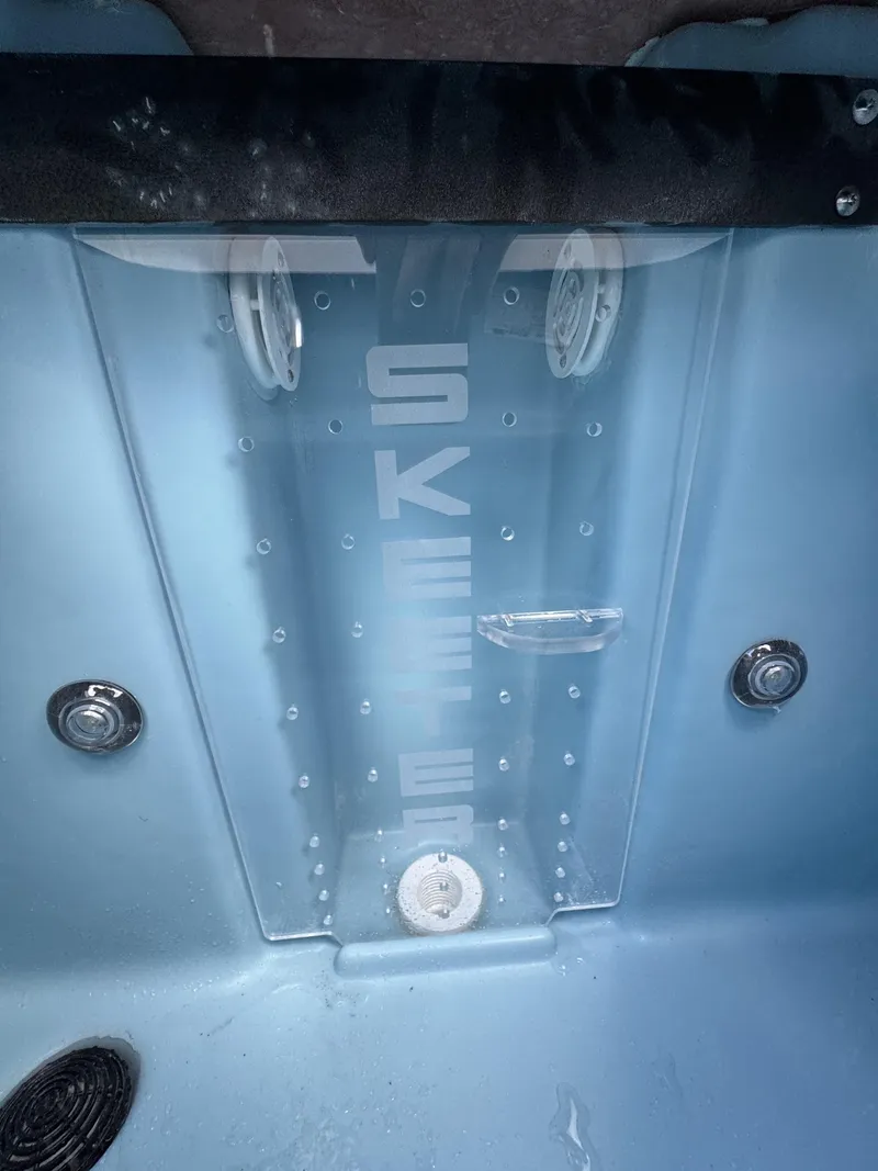 Slide: The Image of Close-up of a blue boat interior with measurement markings and jets. - 47