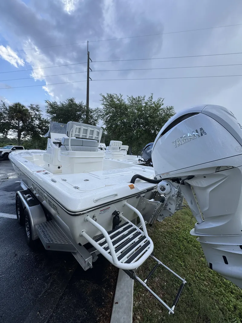 Slide: The Image of 2026 Skeeter SX Series SX241 on a trailer, featuring a Yamaha outboard motor. - 7