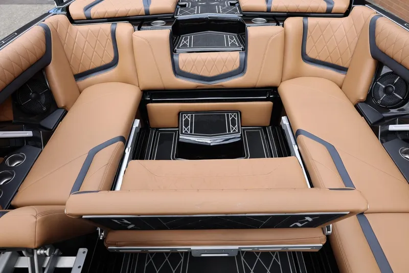 Slide: The Image of Luxurious interior of 2021 Tigé 23ZX boat with tan leather seating and modern design. - 27
