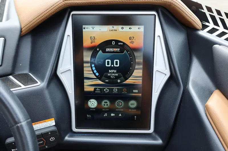 Slide: The Image of Touchscreen dashboard of a 2021 Tigé 23ZX boat displaying speed and control settings. - 37