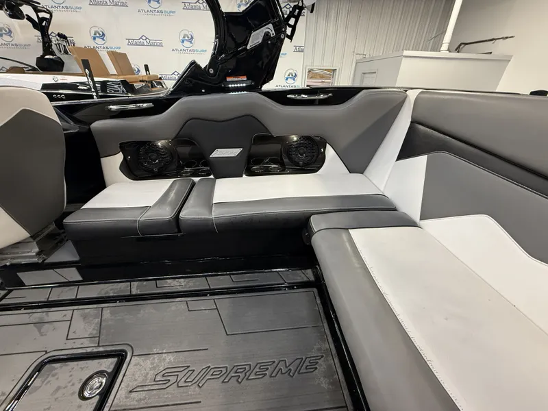Slide: The Image of Interior of a 2020 Supreme ZS 232 boat with gray and white seating. - 10
