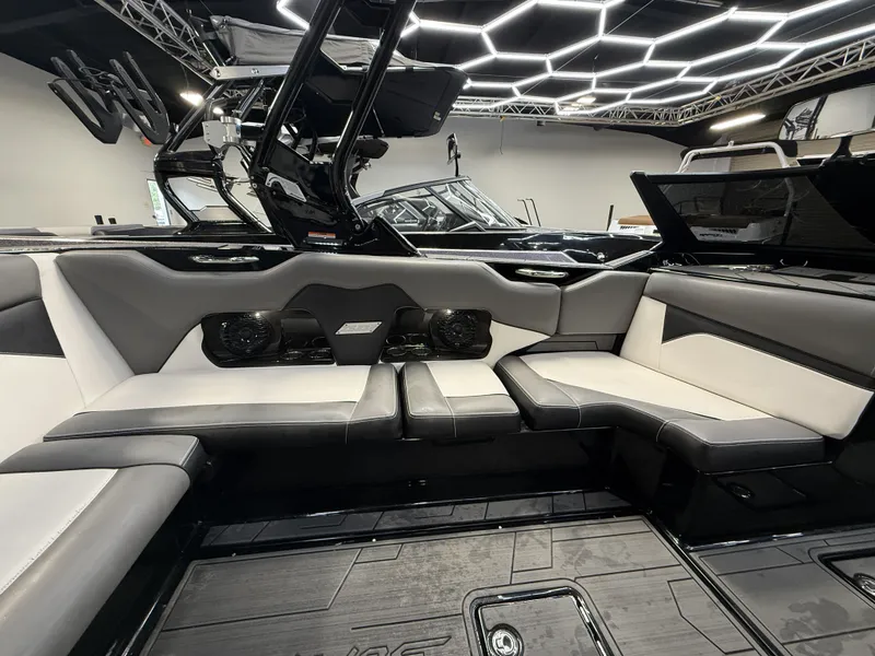 Slide: The Image of Interior of a 2020 Supreme ZS 232 boat with sleek black and white seating. - 14