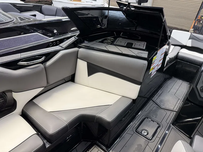 Slide: The Image of Interior of a 2020 Supreme ZS 232 boat with gray and white seating. - 15
