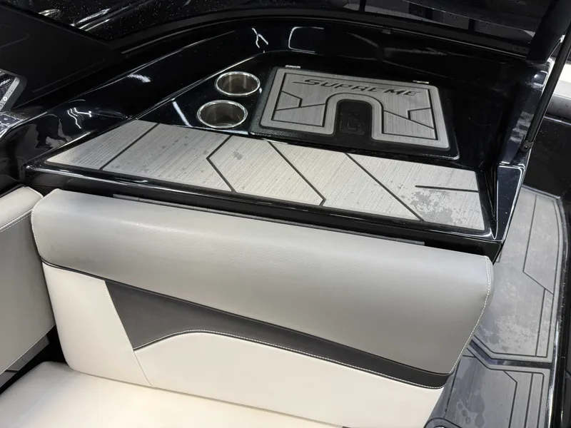 Slide: The Image of Interior of a 2020 Supreme ZS 232 boat with stylish design and cup holders. - 16