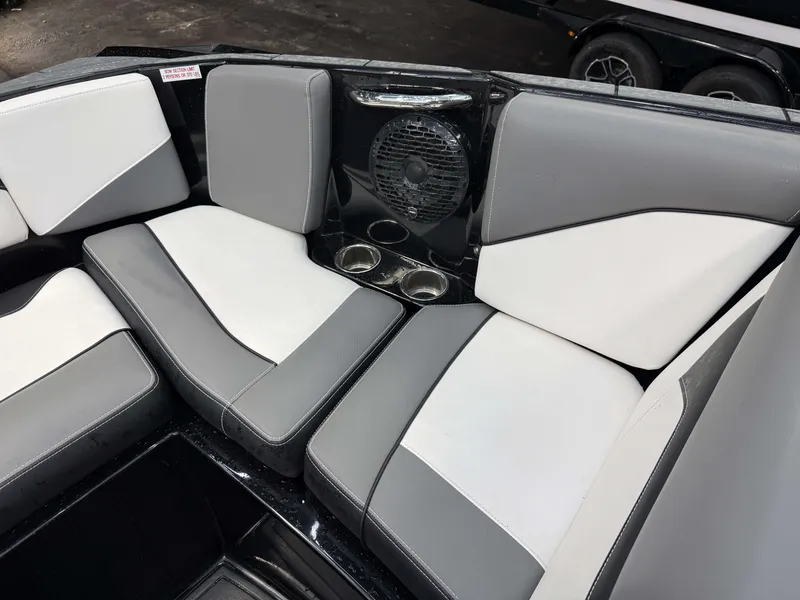 Slide: The Image of Interior of a 2020 Supreme ZS 232 boat with gray and white seating. - 24