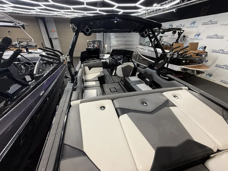 Slide: The Image of The image shows the interior of a 2020 Supreme ZS 232 boat with modern seating. - 7