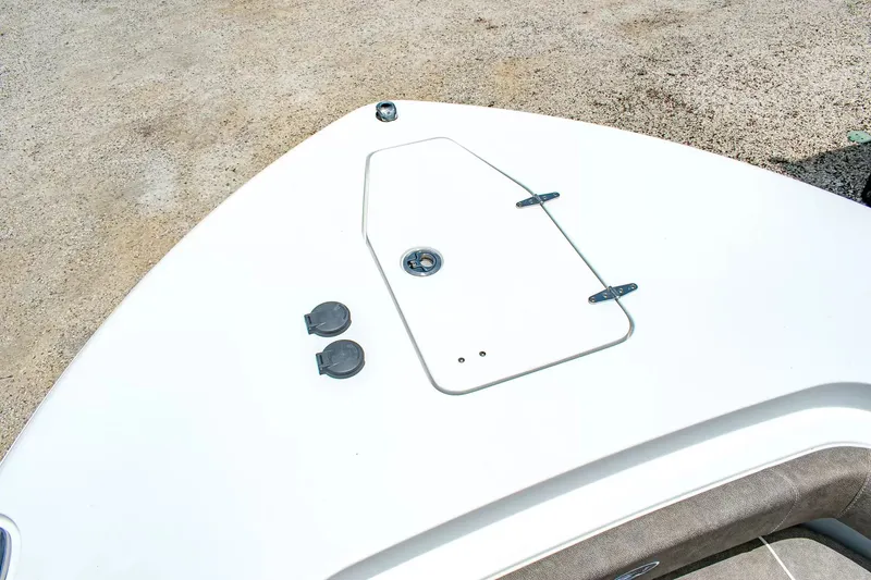 Slide: The Image of Bow deck of a Sea Hunt Gamefish 25 with hatches and fittings. - 23