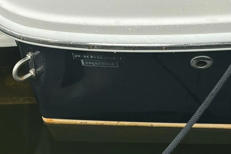 Slide: The Image of 2014 Sea Ray 260 Sundeck boat hull with identification number visible. - 14