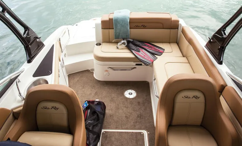 Slide: The Image of Manufacturer Provided Image: 2014 Sea Ray 260 Sundeck interior with tan seating and boating accessories. - 20