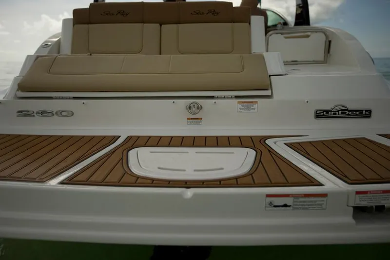 Slide: The Image of Manufacturer Provided Image: 2014 Sea Ray 260 Sundeck boat rear view with teak swim platform. - 21