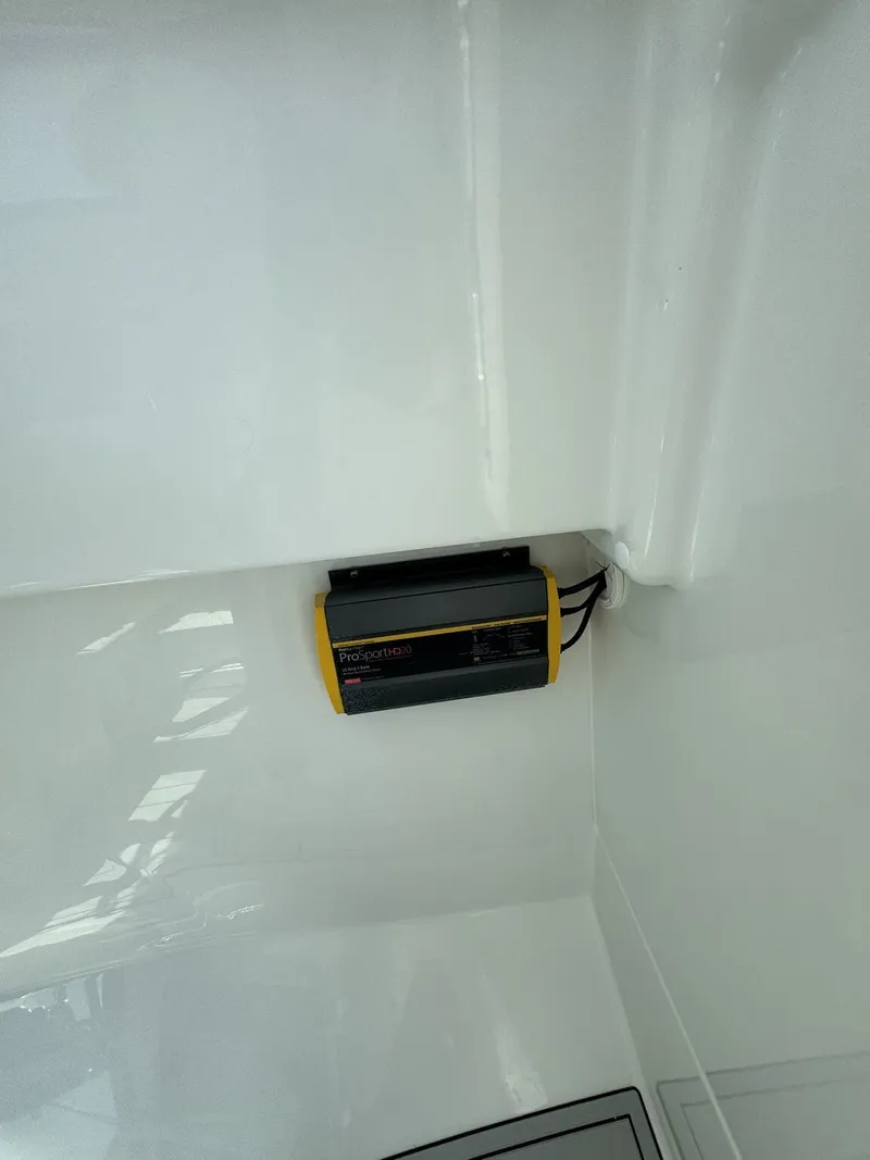 Slide: The Image of An electronic device is mounted on the interior wall of a boat. - 14