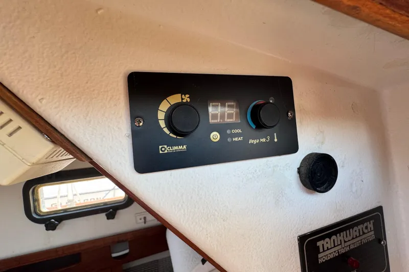 Slide: The Image of Control panel inside 1989 Cape Dory 30 Motorsailer, featuring Clima Vega Mk3 system. - 35