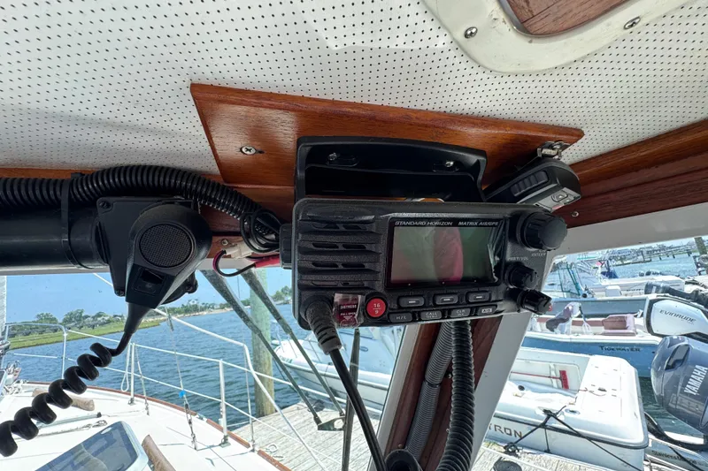 Slide: The Image of Interior view of a 1989 Cape Dory 30 Motorsailer with marine radio equipment. - 19