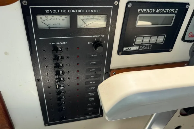 Slide: The Image of 1989 Cape Dory 30 Motorsailer control panel with 12V DC system and energy monitor. - 41