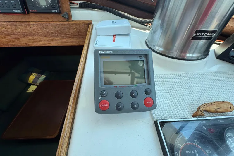 Slide: The Image of Cockpit of 1989 Cape Dory 30 Motorsailer with Raymarine autopilot display. - 15