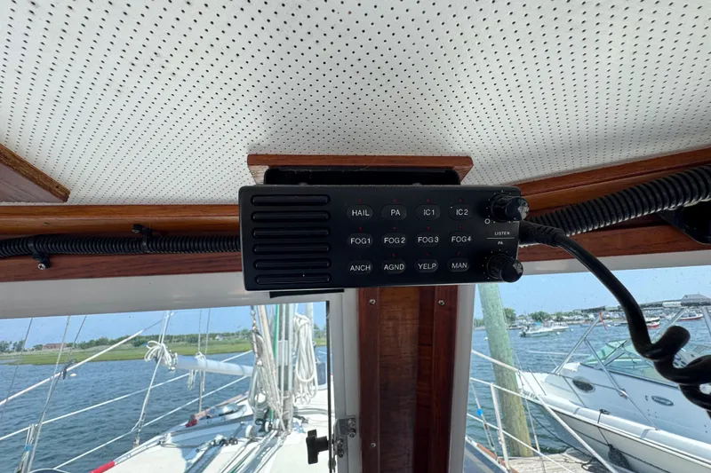 Slide: The Image of Interior view of a 1989 Cape Dory 30 Motorsailer with a mounted communication device. - 24