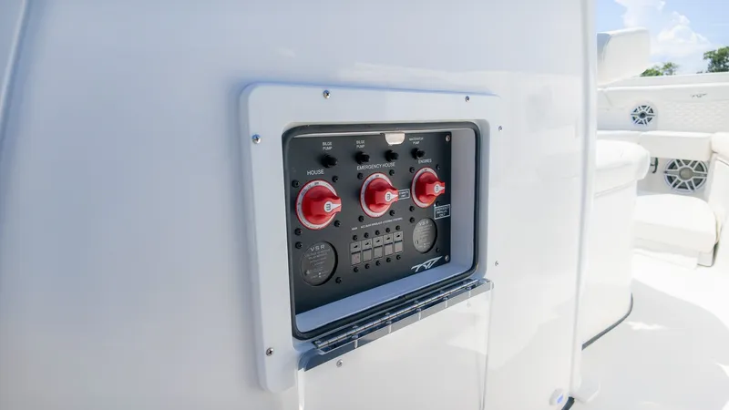 Slide: The Image of Close-up of a control panel area on a Tidewater 272 CC Adventure boat. - 26