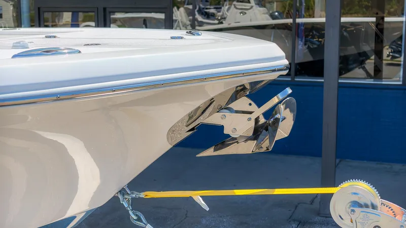 Slide: The Image of The bow view of a Tidewater 272 CC Adventure boat with an anchor and winch. - 4