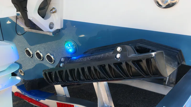 Slide: The Image of Close-up of the stern of a Tidewater 272 CC Adventure boat with Seakeeper stabilizer. - 7