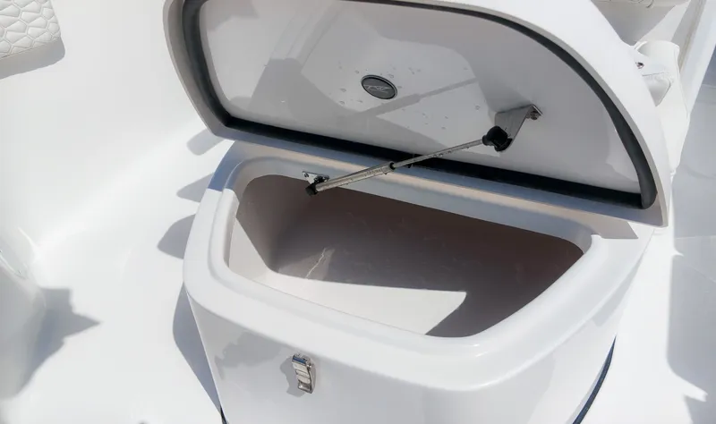 Slide: The Image of An open storage compartment on a 2027 Tidewater 272 CC Adventure boat. - 35
