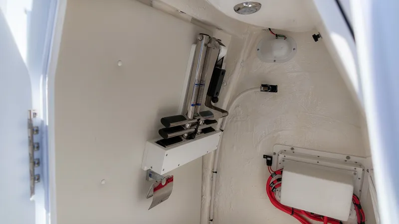 Slide: The Image of Interior view of a boat with electrical components and wiring. - 37