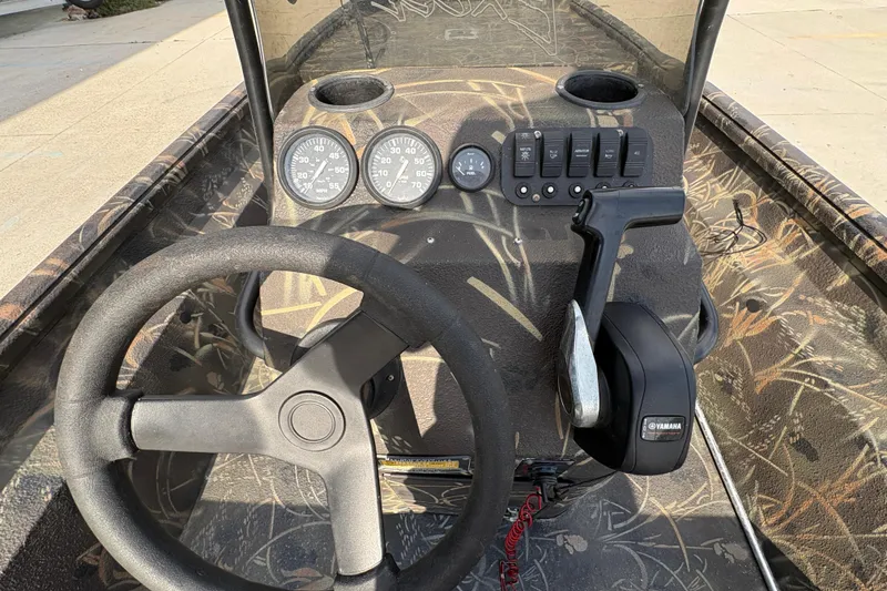 Slide: The Image of 2018 Excel 1854 Shallow Water F4 Console with steering wheel and control panel. - 14