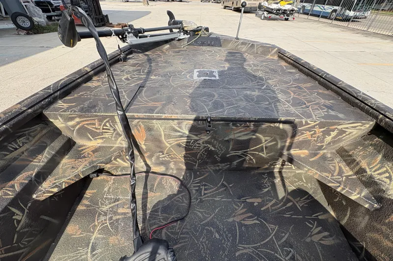 Slide: The Image of 2018 Excel 1854 Shallow Water F4 Console boat with camouflage interior design. - 17